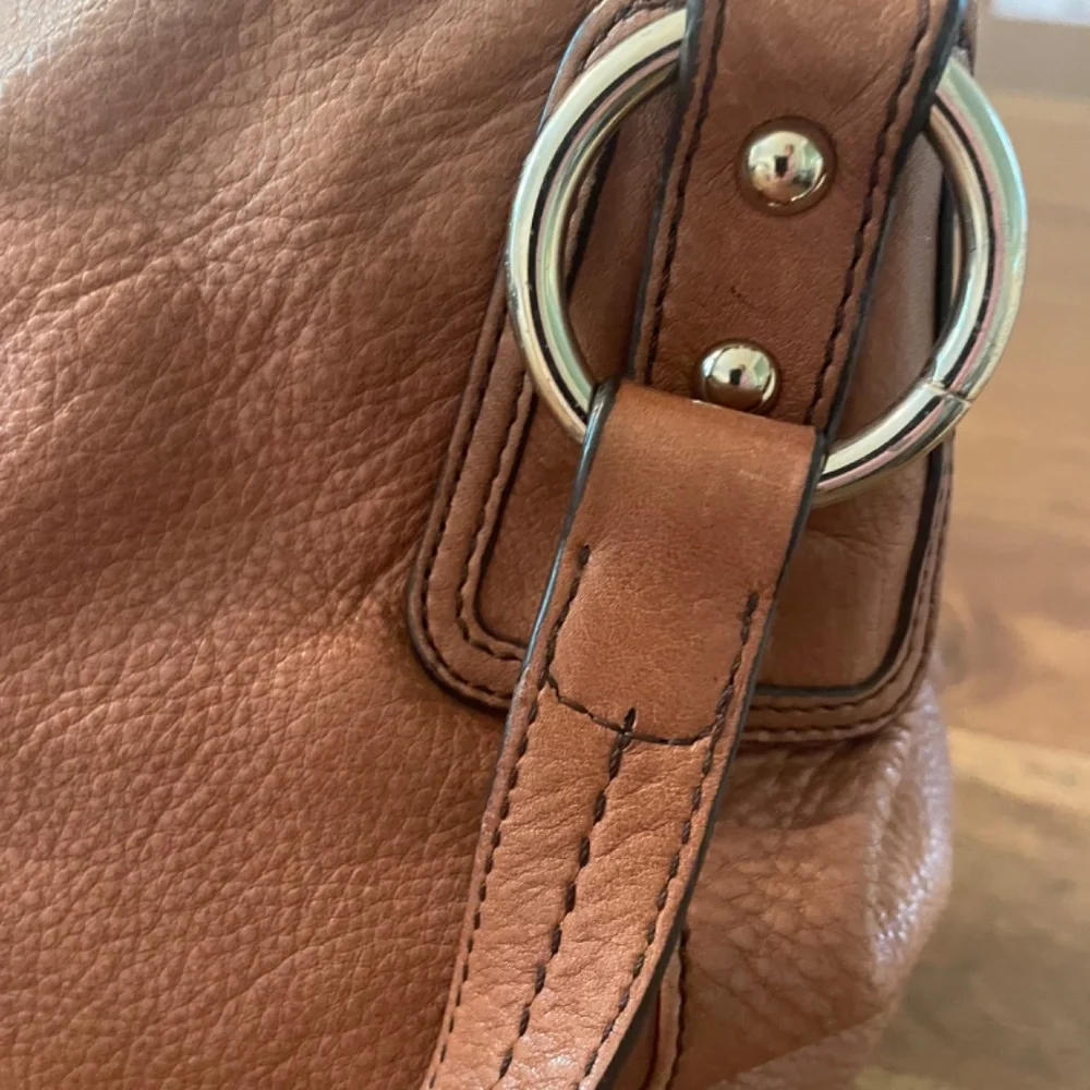 SAK brown leather hobo bag and phone wallet